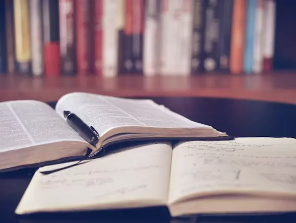 Academic typing service specialist formatting a university research thesis document according to strict guidelines.